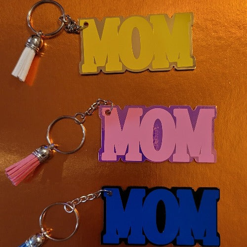 MOM keychain (acrylic) with a tassel.  Great for mom, grandma, wife, mom to be or treat yourself.