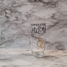 Load image into Gallery viewer, Celebrate your wedding or anniversary birthday with a glitz and glam stemless champagne glass. Add a name and/or special date to remember your day forever. You can a pick the vinyl color to match your special day.  Great for weddings and anniversaries.
