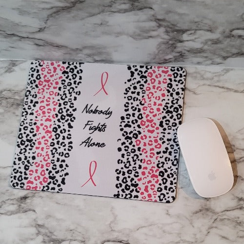 Nobody Fights Alone Breast Cancer mouse pad. You are a survivor and your village has your back.