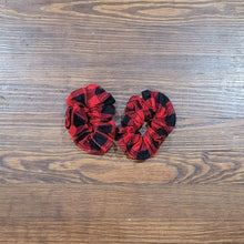 Load image into Gallery viewer, Handmade buffalo plaid hair scrunchie. A comfortable way to keep your hair up and it even looks cute on your wrist when you want to take your hair down.
