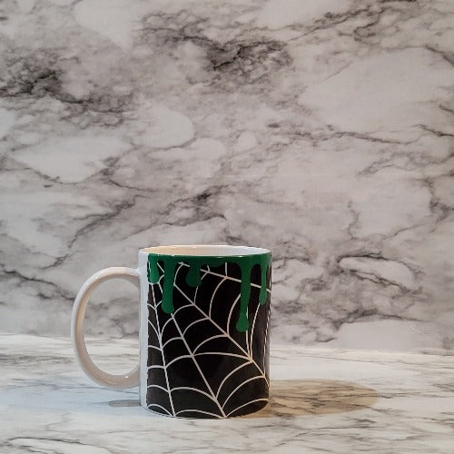 This vibrant, durable, and long lasting Spiderweb Drip mug will stand out. Drink your favorite coffee or tea with a mug that shows off your style and personality. Make your Spiderweb Drip mug extra special by adding a name.  Great gifts to a teacher, boss, friend or treat yourself.  You can put hot and cold drinks in them. 