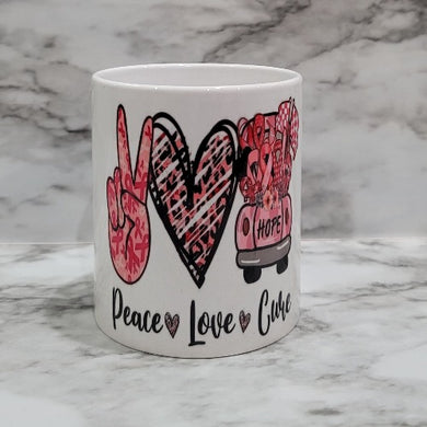 This vibrant, durable, and long lasting Breast Cancer Peace, Love, Cure mug will stand out. Drink your favorite coffee or tea with a mug that shows off your style and personality. Make your Peace, Love, Cure mug extra special by adding a name.