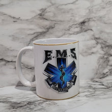 Load image into Gallery viewer, This EMS mug is the perfect way to say thank you, show love and support to a local hero. Let them know how much they are appreciated for all that they do. It is vibrant, long lasting, and durable. Add a name to take it to the next level.
