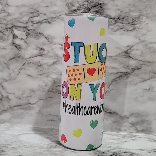 This Stuck On You #Health Care Worker sublimation tumbler can be personalized with a name to take it to the next level. Vibrant colors, durable, and long lasting.