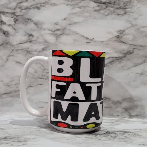 This Black Father's Matter vibrant, durable, and long lasting mug will stand out. Drink your favorite coffee or tea with a mug that shows off your style and personality. Make your Black Father's Matter mug extra special by adding a name.  Great gifts to a teacher, boss, friend or treat yourself.  You can put hot and cold drinks in them. 
